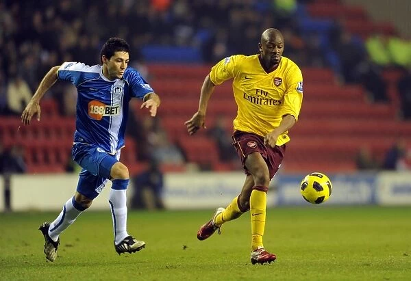 Abou Diaby (Arsenal) Antonlin Alcaraz (Wigan). Wigan Athletic 2: 2 Arsenal
