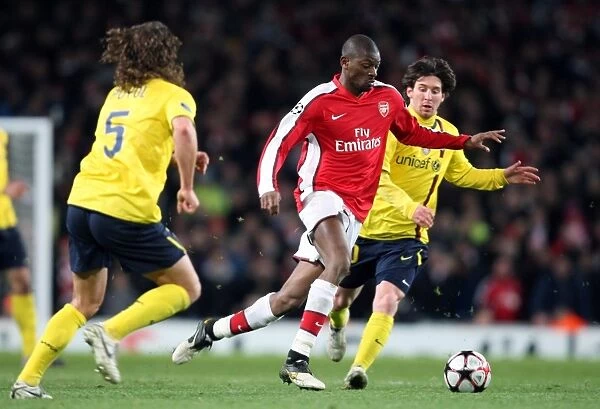 Abou Diaby (Arsenal) Carles Puyol and Lionel Messi (Barcelona). Arsenal 2: 2 Barcelona