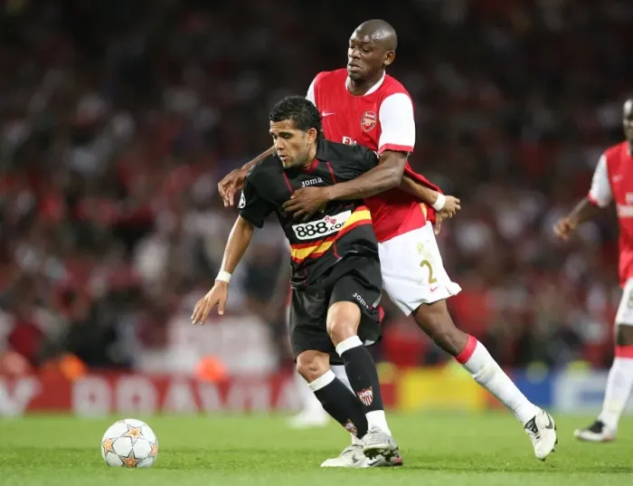 Framed Print : Abou Diaby (Arsenal) Daniel Alves (Sevilla) Framed Print : Abou Diaby (Arsenal) Daniel Alves (Sevilla)