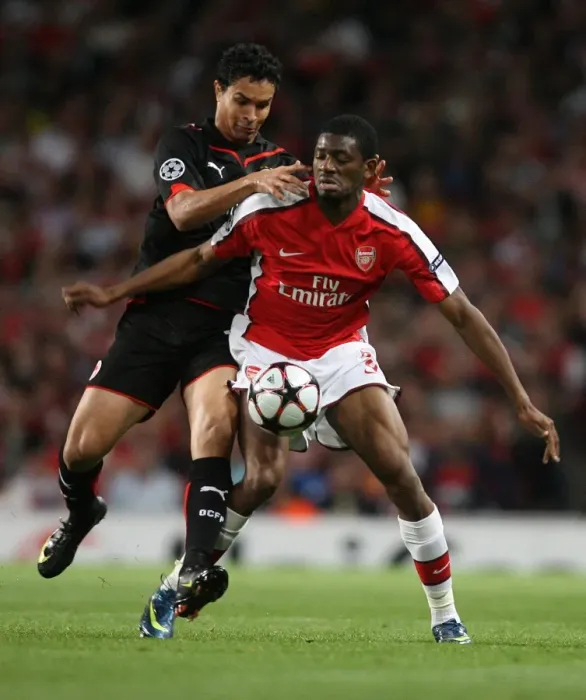 Framed Print : Abou Diaby (Arsenal) Dudu (Olympiacos) Framed Print : Abou Diaby (Arsenal) Dudu (Olympiacos)