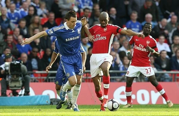 Abou Diaby (Arsenal) John Terry (Chelsea)
