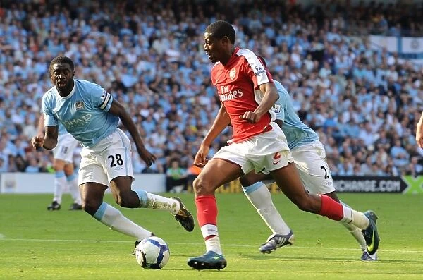 Abou Diaby (Arsenal) Kolo Toure (Man City)