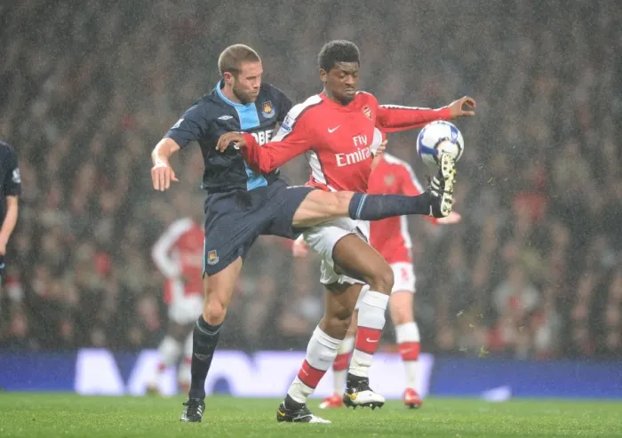 Framed Print : Abou Diaby (Arsenal) Matthew Upson (West Ham). Arsenal 2: 0 West Ham United Framed Print : Abou Diaby (Arsenal) Matthew Upson (West Ham). Arsenal 2: 0 West Ham United