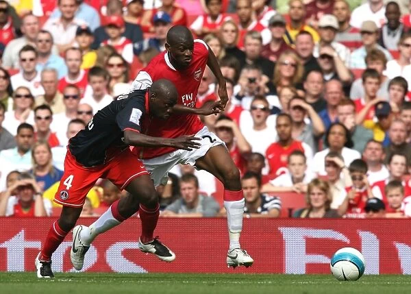 Abou Diaby (Arsenal) Youssuf Mulumbu (PSG)
