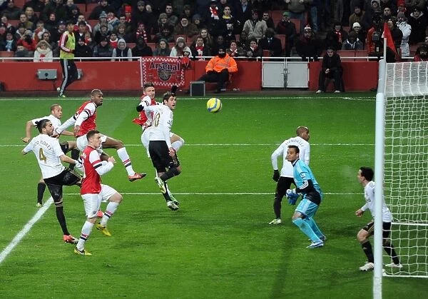 Abou Diaby Goes for the Header: Arsenal vs Swansea City - FA Cup Third Round Replay, 2013