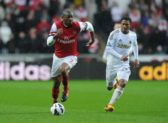 Framed Print : Abou Diaby Outmaneuvers Jonathan de Guzman: A Premier League Battle at Swansea City, 2012-13 Framed Print : Abou Diaby Outmaneuvers Jonathan de Guzman: A Premier League Battle at Swansea City, 2012-13