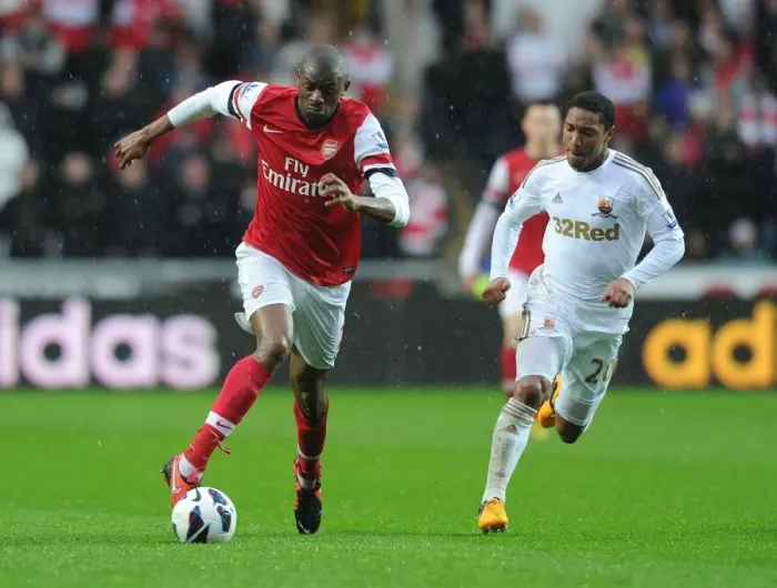 Framed Print : Abou Diaby Outmaneuvers Jonathan de Guzman: A Premier League Battle at Swansea City, 2012-13 Framed Print : Abou Diaby Outmaneuvers Jonathan de Guzman: A Premier League Battle at Swansea City, 2012-13