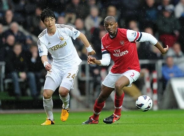 Abou Diaby Outmaneuvers Ki Sung-Yueng: Swansea City vs. Arsenal, Premier League, 2012-2013