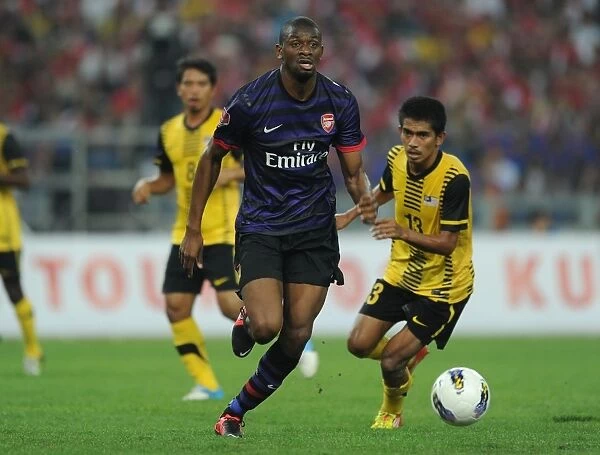 Abou Diaby vs Azamuddin Akil: A Clash on the Arsenal Pre-Season Field