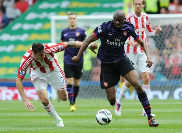 Framed Print : Abou Diaby vs. Geoff Cameron: A Battle at Britannia Stadium - Stoke City vs. Arsenal (2012-13)
