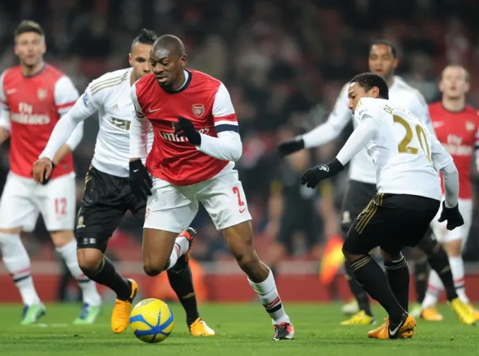 Framed Print : Abou Diaby vs. Jonathan De Guzman: FA Cup Third Round Replay Showdown at Arsenal's Emirates Stadium Framed Print : Abou Diaby vs. Jonathan De Guzman: FA Cup Third Round Replay Showdown at Arsenal's Emirates Stadium
