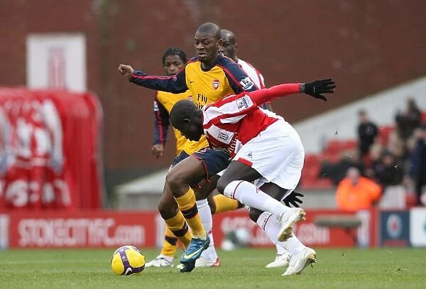Abu Diaby (Arsenal) Amdy Faye (Stoke)
