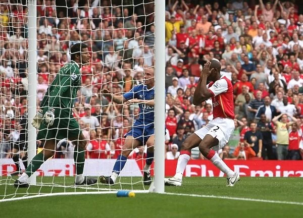 Abu Diaby (Arsenal) holds his head after his header goes wide