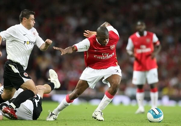 Abu Diaby and Marek Kulic Clash in Arsenal's 3-0 Victory over Sparta Prague in the UEFA Champions League