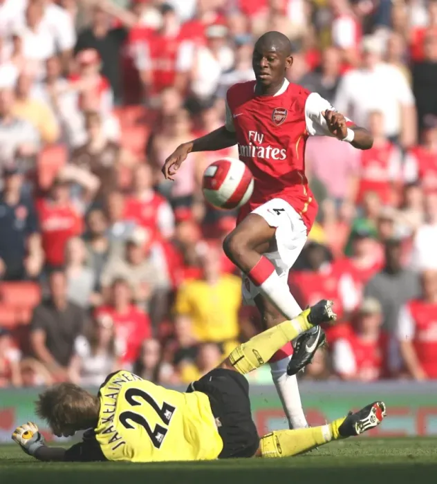 Framed Print : Abu Diaby vs. Jussi Jääskeläinen: Arsenal's Edge over Bolton Wanderers in the FA Premiership, 2007