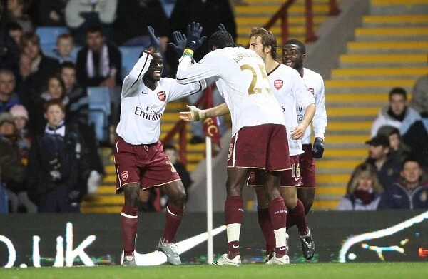 Adebayor and Eboue: Dynamic Duo Celebrates Arsenal's Victory over Aston Villa (2007)