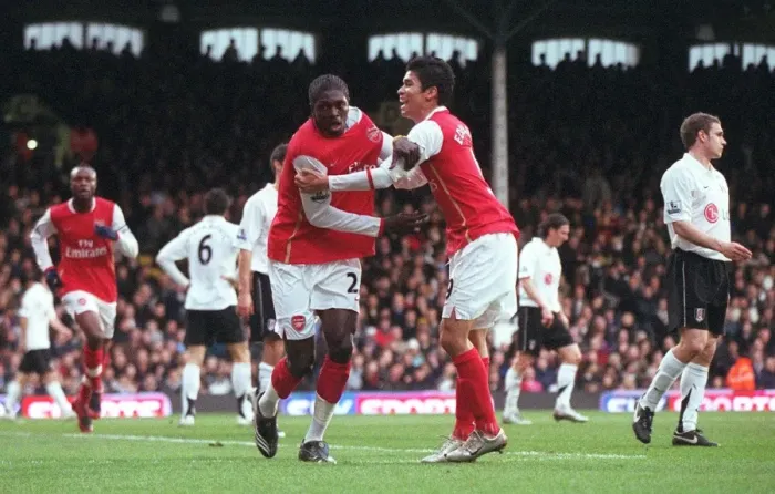 Framed Print : Adebayor and Eduardo: Double Trouble - Arsenal's Unforgettable Goal Celebration vs. Fulham (2007)