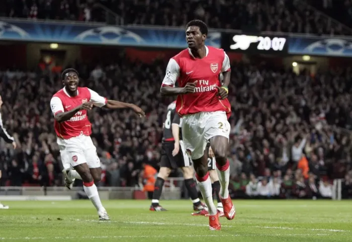 Framed Print : Adebayor and Toure: Unforgettable Goal Celebration in Arsenal's Champions League Quarterfinal vs. Liverpool (2008)