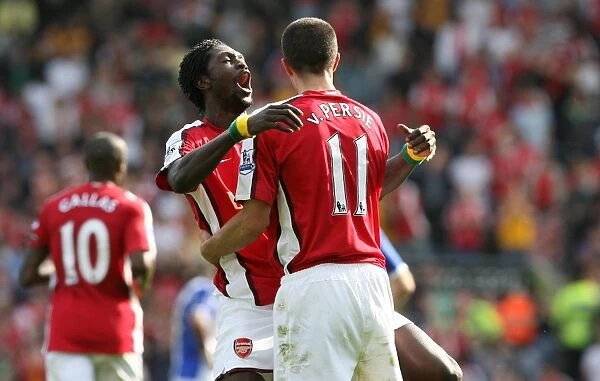 Adebayor and van Persie: Double Trouble - Arsenal's Unstoppable Duo Celebrates Goals Against Blackburn (4-0)