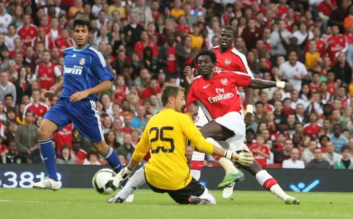 Framed Print : Adebayor vs. Dudek: Arsenal's Edge over Real Madrid in the Emirates Cup Clash, 2008 Framed Print : Adebayor vs. Dudek: Arsenal's Edge over Real Madrid in the Emirates Cup Clash, 2008