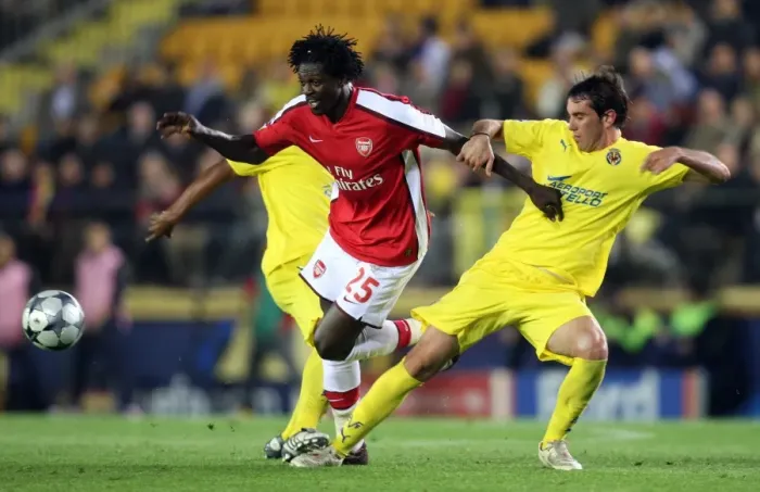 Framed Print : Adebayor vs. Godin: 1st Leg Quarterfinal Showdown in the UEFA Champions League: Arsenal vs. Villarreal (4-7-09)