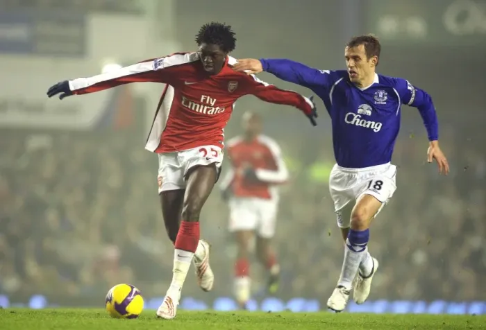 Framed Print : Adebayor vs. Neville: The Intense Rivalry at Goodison Park, January 2009 (1:1 Arsenal vs. Everton)
