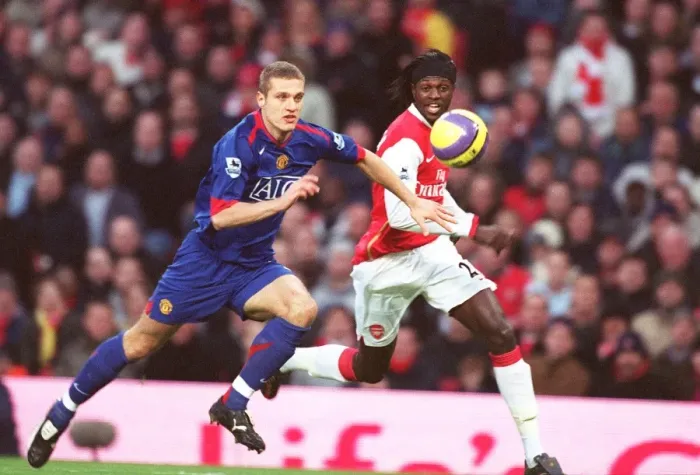 Framed Print : Adebayor vs. Vidic: Arsenal's Edge over Manchester United in the FA Premiership (21 / 01 / 07)