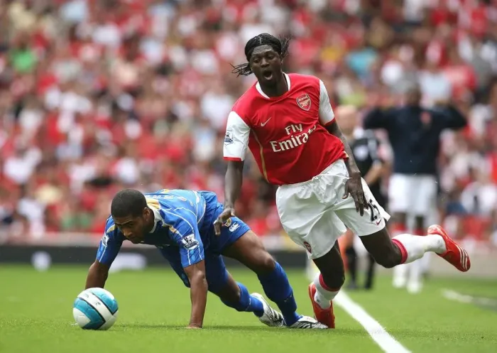 Framed Print : Adebayor's Brace: Arsenal Triumphs 3-1 over Portsmouth