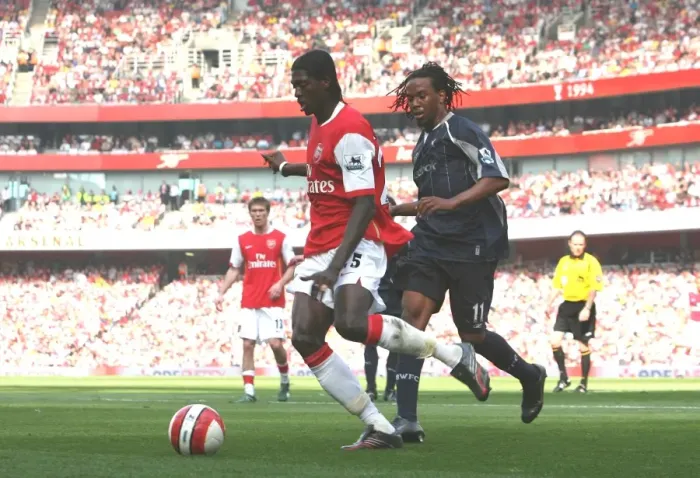 Framed Print : Adebayor's Double: Arsenal Edge Past Bolton 2-1 in FA Premiership Thriller