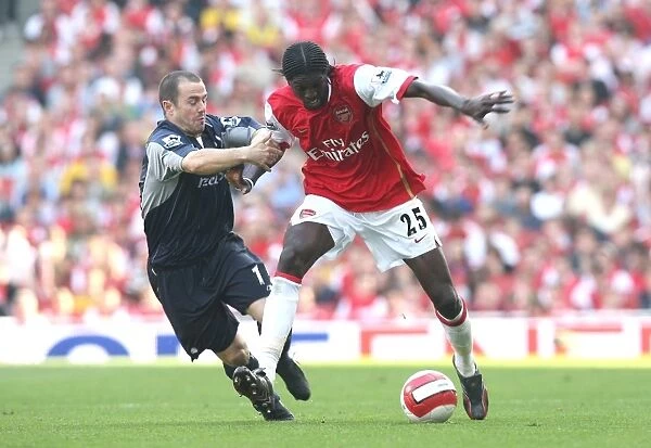Adebayor's Double: Arsenal's Thrilling 2-1 FA Premiership Victory Over Bolton