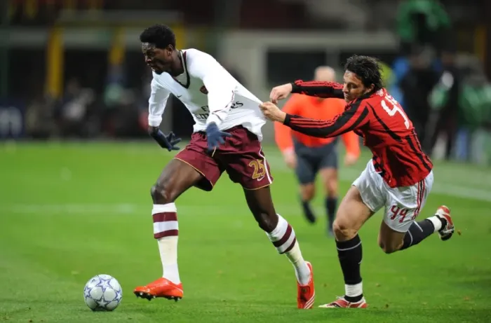 Framed Print : Adebayor's Double Strike: Arsenal Overpowers AC Milan in Champions League Showdown (Massimo Oddo) Framed Print : Adebayor's Double Strike: Arsenal Overpowers AC Milan in Champions League Showdown (Massimo Oddo)