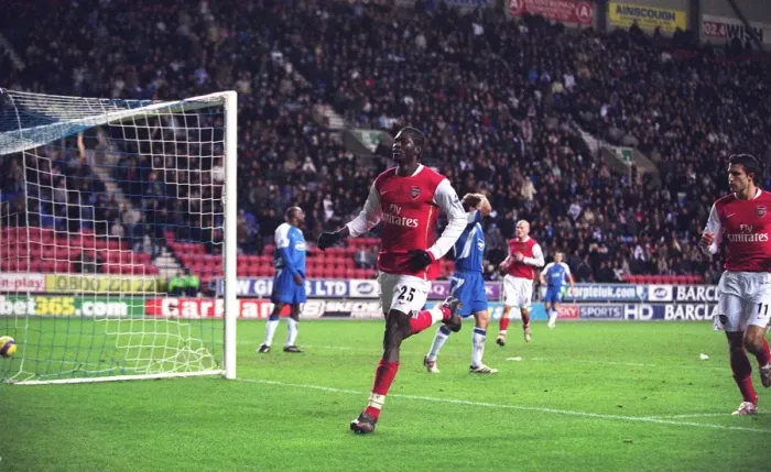 Framed Print : Adebayor's Goal Celebration: Arsenal's 1-0 Win Over Wigan, FA Premiership, 2006
