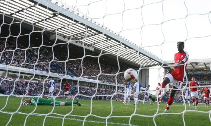 Framed Print : Adebayor's Hat-Trick: Arsenal Crushes Blackburn 4-0