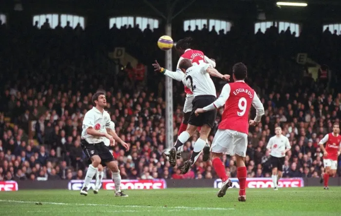 Framed Print : Adebayor's Intense Goal: Arsenal's 2-0 Over Fulham in the Premier League