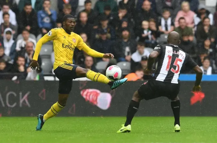 Framed Print : Ainsley Maitland-Niles in Action: Arsenal vs. Newcastle United, Premier League 2019-20
