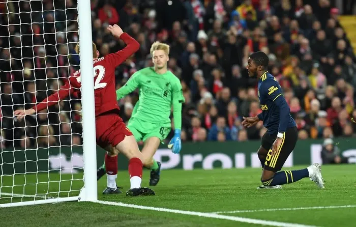 Framed Print : Ainsley Maitland-Niles Stuns Liverpool: Arsenal's Shocking Carabao Cup Goal at Anfield
