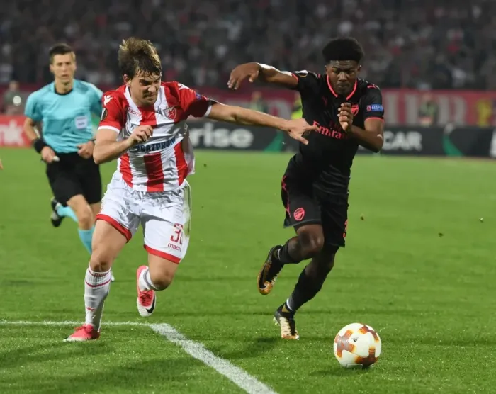 Framed Print : Ainsley Maitland-Niles vs Filip Stojkovic: Battle in the Europa League between Crvena Zvezda and Arsenal Framed Print : Ainsley Maitland-Niles vs Filip Stojkovic: Battle in the Europa League between Crvena Zvezda and Arsenal