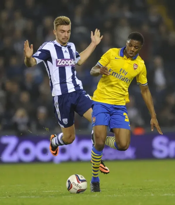 Framed Print : Akpom vs. Morrison: A Battle in the Capital One Cup - Arsenal's Akpom Clashes with West Bromwich Albion's Morrison (September 2013) Framed Print : Akpom vs. Morrison: A Battle in the Capital One Cup - Arsenal's Akpom Clashes with West Bromwich Albion's Morrison (September 2013)