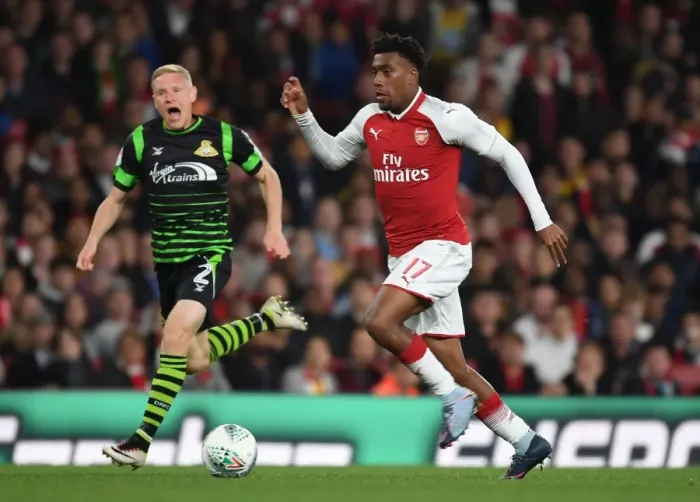 Framed Print : Alex Iwobi Outmaneuvers Craig Alcock in Arsenal's Carabao Cup Victory