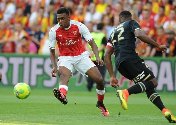 Alex Iwobi Outmaneuvers Lens Defender During Arsenal's Pre-Season Friendly