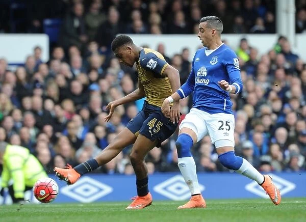 Alex Iwobi Scores Under Pressure: Everton vs Arsenal, Premier League 2015-16 - Iwobi's Goal Amidst Funes Mori's Challenge