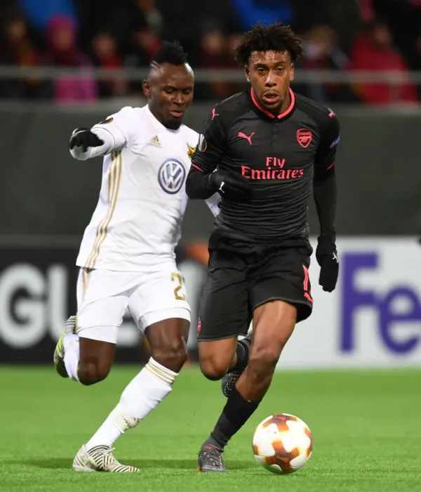 Framed Print : Alex Iwobi vs. Samuel Mensah: Clash in the Europa League between Ostersunds and Arsenal