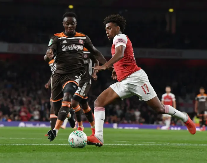 Framed Print : Alex Iwobi's Slick Moves: Outmaneuvering Moses Odubajo in Arsenal's Carabao Cup Victory