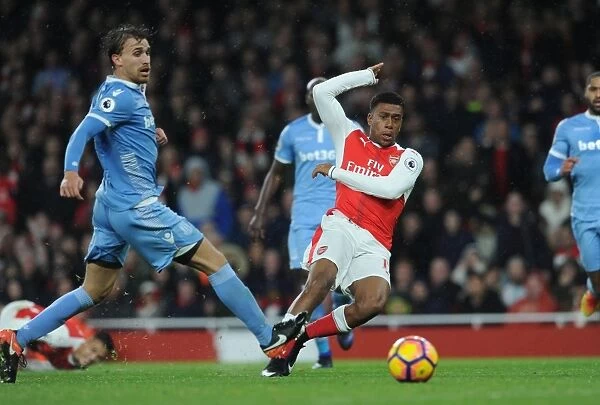 Alex Iwobi's Thrilling Goal Past Marc Muniesa: Arsenal's Victory over Stoke City (2016-17)