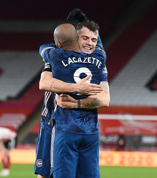 Alex Lacazette and Granit Xhaka Celebrate Arsenal's Third Goal Against Sheffield United (April 2021)
