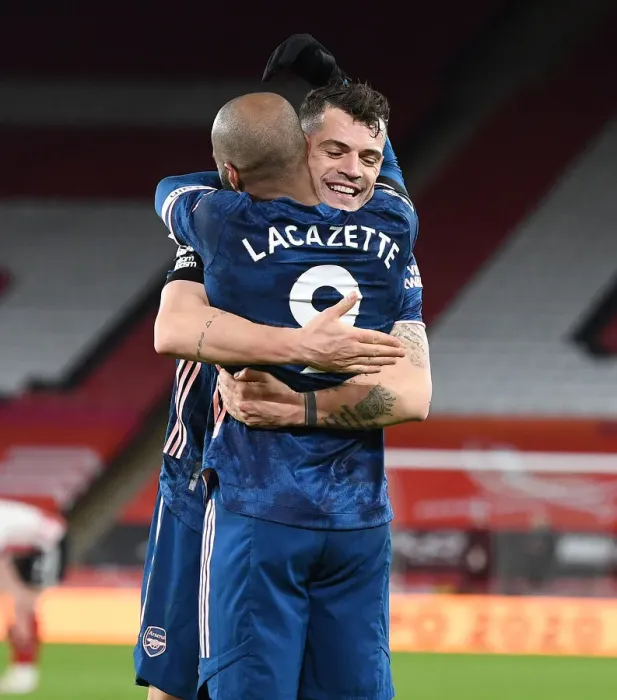 Framed Print : Alex Lacazette and Granit Xhaka Celebrate Arsenal's Third Goal Against Sheffield United (April 2021)