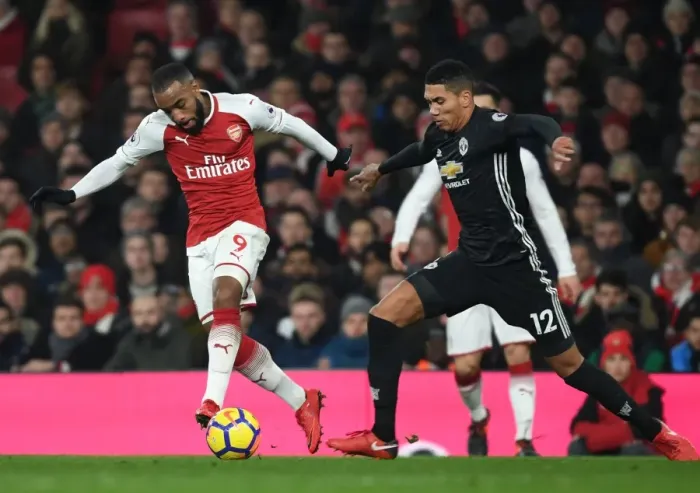 Framed Print : Alex Lacazette Outmaneuvers Chris Smalling: Arsenal vs Manchester United, Premier League 2017-18 Framed Print : Alex Lacazette Outmaneuvers Chris Smalling: Arsenal vs Manchester United, Premier League 2017-18