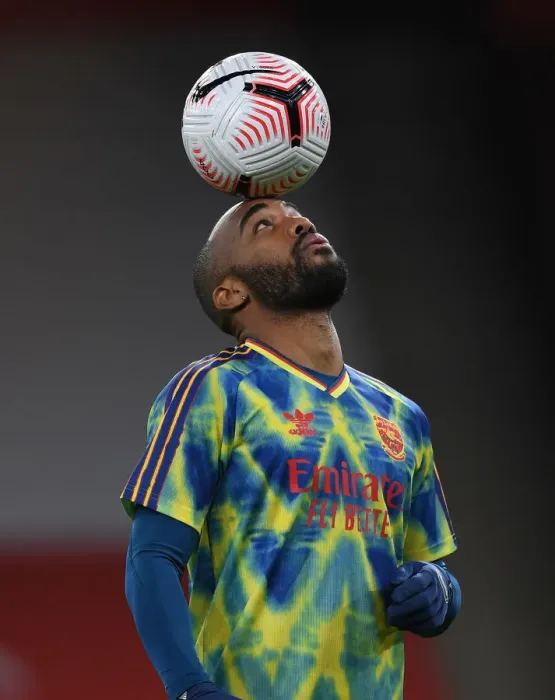 Framed Print : Alex Lacazette Prepares for Arsenal vs. Leicester Clash in Empty Emirates Stadium (2020-21 Premier League)