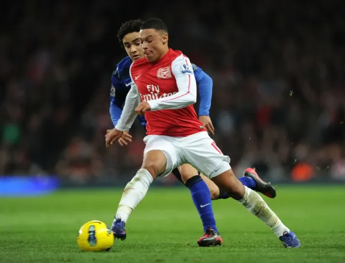 Framed Print : Alex Oxlade-Chamberlain (Arsenal) Rafael (Man Utd). Arsenal 1: 2 Manchester United Framed Print : Alex Oxlade-Chamberlain (Arsenal) Rafael (Man Utd). Arsenal 1: 2 Manchester United
