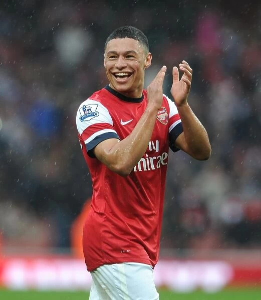 Alex Oxlade-Chamberlain: Arsenal's Determined Midfielder in Action against Norwich City (2012-13)